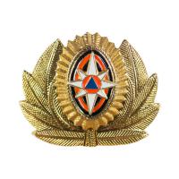 Кокарда МЧС в обрамлении золота